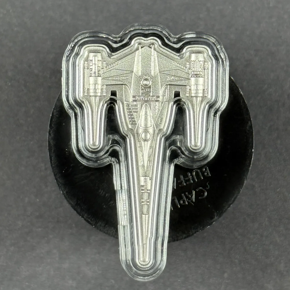 2023 Niue Star Wars Mandalorian N-1 Starfighter shaped one-ounce silver coin in its capsule